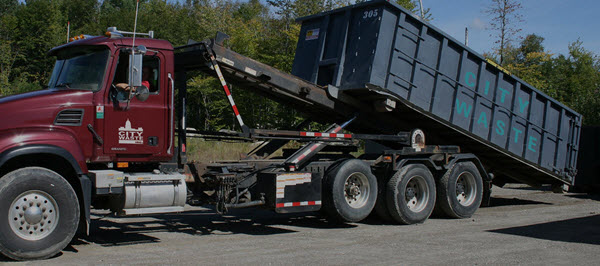 truck_unloading_dumpster truck_unloading_dumpster